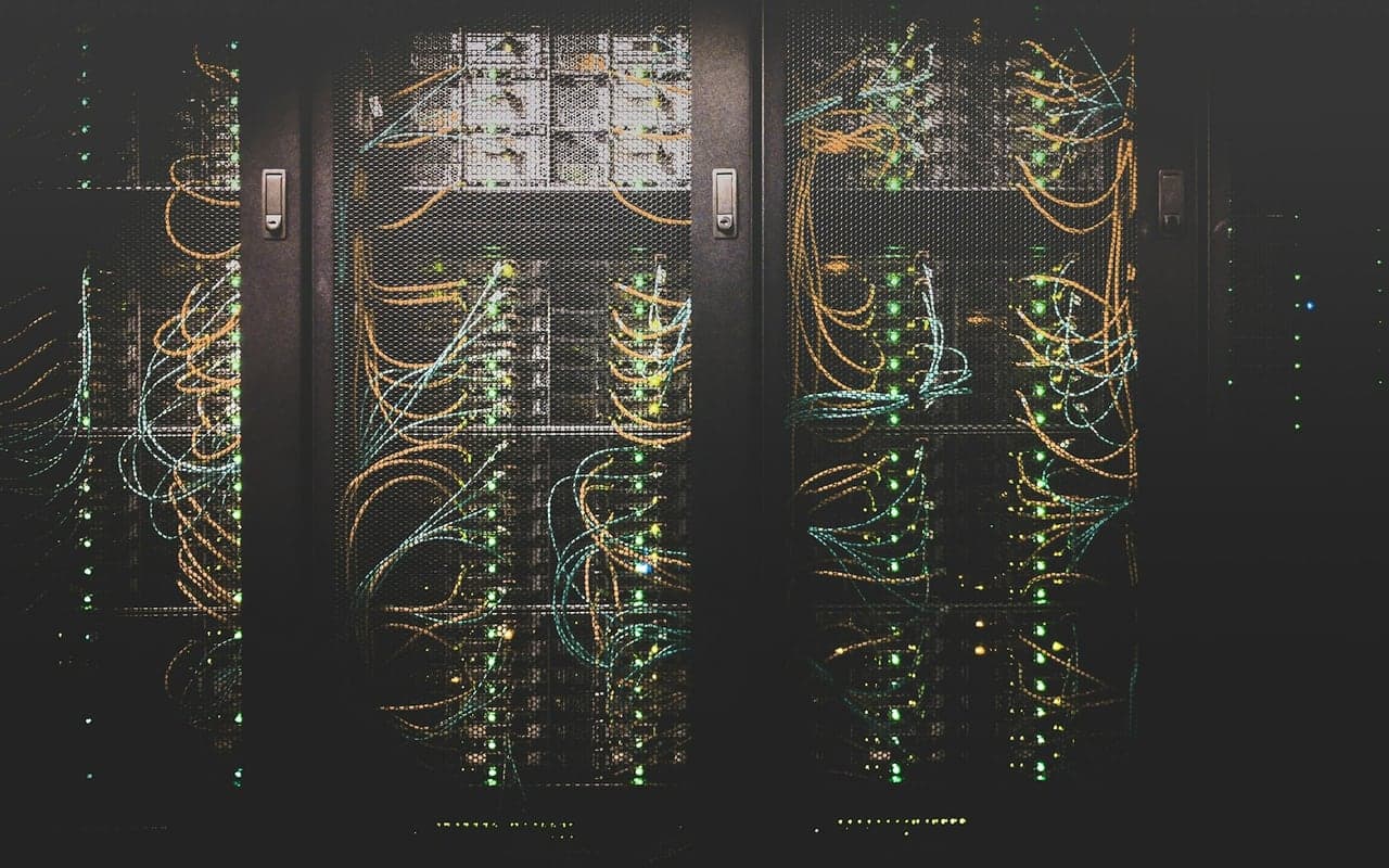 Server racks and network cables in a working data center