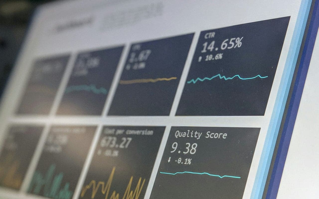 Software quality metrics and test results displayed on a monitor